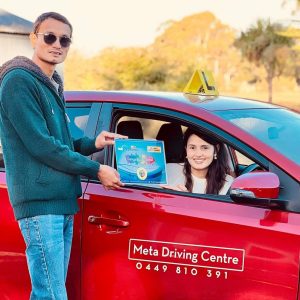 Receiving Graduate Certificate from Meta Driving Centre